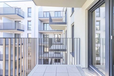 Sonnige Eleganz: Lichtdurchflutete Wohnung mit Designküche, Balkon und Tiefgaragenoption