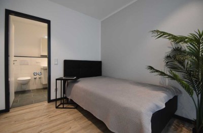 Möbliertes Penthouse-Apartment, 2 Zimmer für 1 Person, zentrale Lage, mit Balkon - ab 1.10.2025