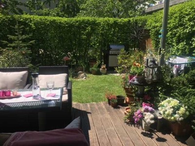 Helle, 4-Zimmer-Garten-Etagen-Eckwohnung mit TG-Platz in Neubiberg