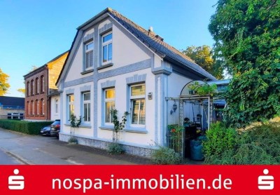 Charme und Charakter inklusive: Teilunterkellertes Wohnhaus mit Wintergarten, Sauna und Swimmingpool