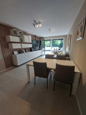 Möblierte 3- Zimmer Traumwohnung mit Einbauküche, großer Terrasse und Tiefgaragenstellplatz