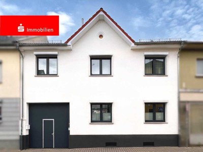 Modernes Reihenmittelhaus in zentraler Lage mit Garten