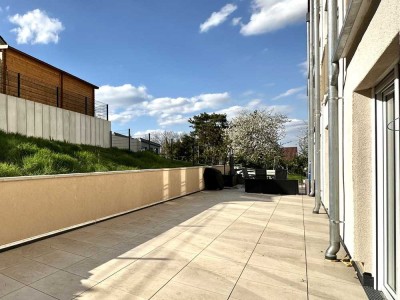Neubau Erstbezug! Exklusive Erdgeschoss-Maisonettewohnung für Familien