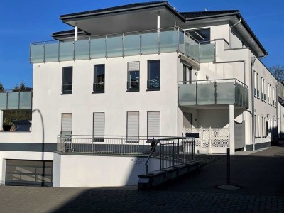 Barrierefrei im Kurort mit Einbauküche, Balkon und Tiefgarage inkl. Wallbox