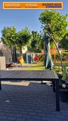Luxus Eigentumswohnung mit großen Garten und Nebengebäuden