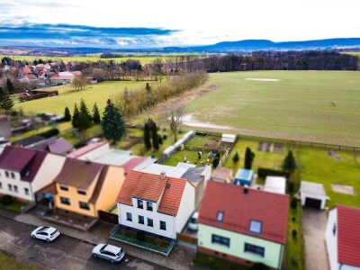 Einfamilienhaus für die Familie mit Garten und Nebengelass