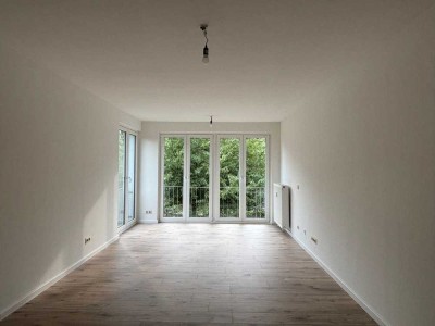 Familienwohnung mit Badewanne und Einbauküche im Grünen