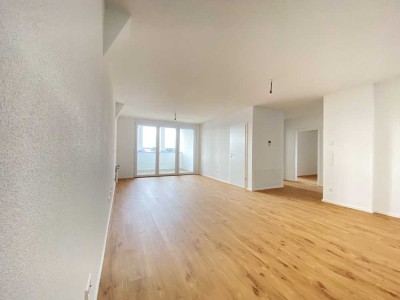 Neubau: 3-Zimmer Wohnung mit Einbauküche, Stellplatz, Garage, Westloggia und Weitblick