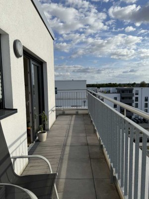 Moderne Penthousewohnung mit 3 Zimmern, großer Dachterrasse und offener Wohnküche in der beliebten L