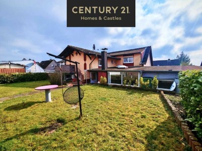 Charmante Dachgeschosswohnung mit Balkon und Gartenzugang