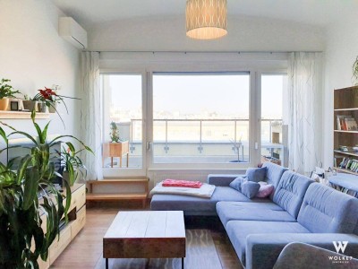 Dachgeschosswohnung mit Loggia und tollem Ausblick in ruhiger Lage und Top-Anbindung | Tiefgarage | Klima