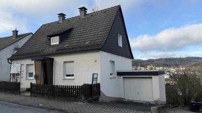Einfamilienhaus mit Garage und großem Grundstück - Genießen Sie den unverbaubaren Blick über Neuenra