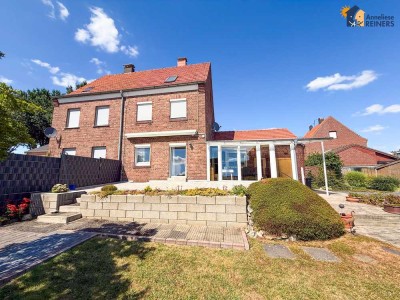 Doppelhaushälfte + Baugrundstück in Heinsberg-Dremmen