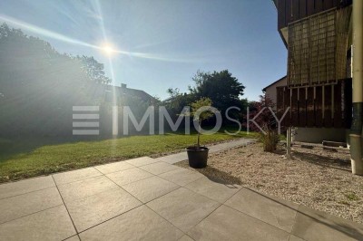 Lichtdurchflutete Gartenwohnung mit Balkon und Stellplatz