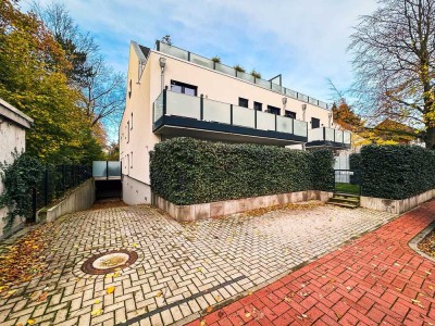 Exklusives Wohnen mit Garten: Moderne Erdgeschosswohnung mit Terrasse und 150 m² Garten