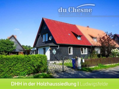 Charmante Doppelhaushälfte in der historischen Holzhaussiedlung