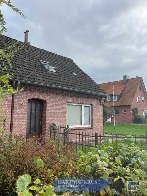 Super-Renditeobjekt! Vermietete Doppelhaushälfte mit Anbauten und Garage