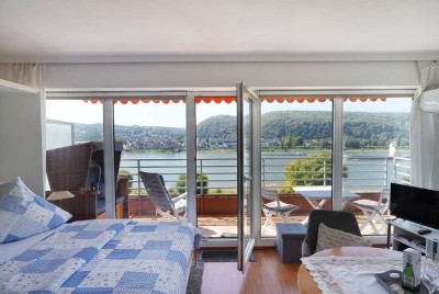 Engel & Völkers: Direkt am Rhein - Apartment für Pendler oder Langzeiturlauber!