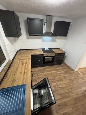 Moderne Erdgeschosswohnung mit Süd-Terrasse & neuer Einbauküche – Erstbezug nach Sanierung