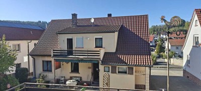 Einfamilienhaus mit großem Grundstück und Garage in Kreuzwertheim