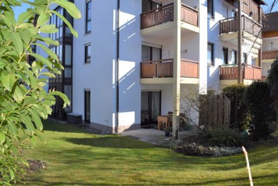Charmante Wohnung mit ca. 200 m² Garten, S/W Terrasse, Parkett,  EBK, Fußbodenheizung