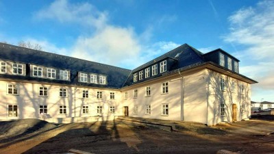 Erstbezug im sanierten Denkmal - komplett erneuerbare Heizenergie, Fussbodenh.,EBK, Terrasse, Stein.