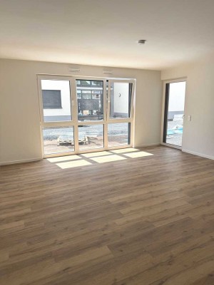 Neubau! Lichtdurchflutete 3-Zimmer Eigentumswohnung mit Sonnenterrasse & Garten