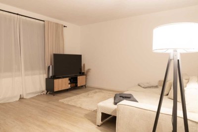 Moderne 2-Zimmer-Wohnung mit Garten, Einbauküche sowie Garage inkl. direktem Zugang zur Wohnung