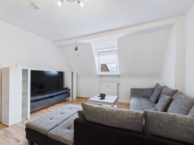 Charmante Dachgeschosswohnung mit Gemeinschaftsgarten – Ideal für Singles & Paare!