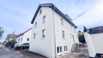 Neubau-Erstbezug! Exklusive 4-Zimmer Wohnung mit Garten in bester Altstadtlage von Monheim am Rhein