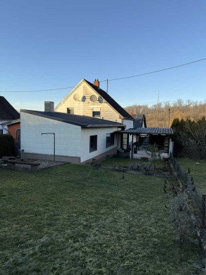 Einfamilienhaus mit Garten und Garage zu verkaufen