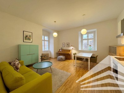 Stilvolle 2 Zimmer-Altbauwohnung mit Küche an der Donaulände