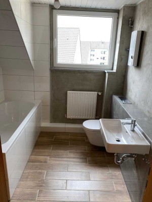 Zentral gelegene, teilmodernisierte DG-Wohnung