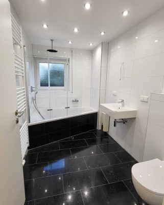 Helle 3-Zimmer-Wohnung mit Hauscharakter, eigenem Garten und hochwertiger Ausstattung