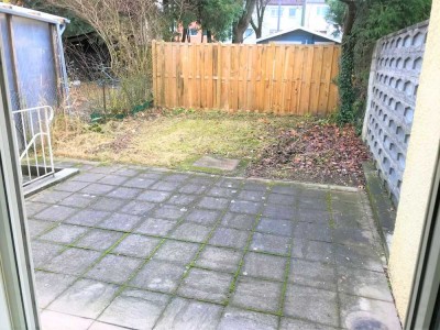 Helle, großzügige 1-Zimmer EG Garten-Wohnung mit Süd-Terrasse und separater Wohnküche mit EBK