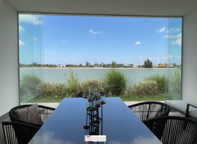 EXKLUSIVER BUNGALOW AM SEE - ERSTE REIHE MIT TRAUMHAFTEM AUSBLICK