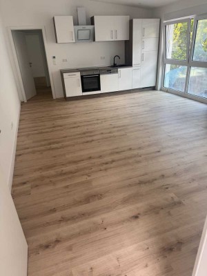 Erstbezug-Wüste! 2-Zimmerwohnung mit EBK, Terrasse und Garage