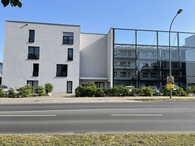 Modern eingerichtete, voll möblierte 2-Zimmer-Wohnung (60 m²) mit Terrasse und kleinem Garten