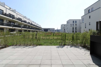 Großzügige Eleganz mit Terrasse und Garten – moderne Etagenwohnung für Anspruchsvolle