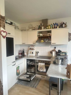Hell & Teilmöbliert: 1-Zimmer-Wohnung mit EBK und Balkon im Herzen von Hattersheim