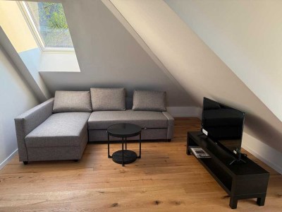 Neubau - möbliertes Appartement mit Garage