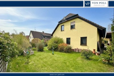Großzügiges Zweifamilienhaus mit idyllischem Garten und vielseitigen Nutzungsmöglichkeiten