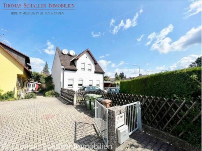 Großzügiges Wohnhaus mit vielseitigen Nutzungsmöglichkeiten und großem Grundstück