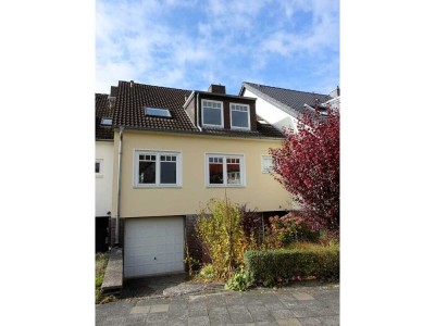 Familienfreundliches Reihenmittelhaus mit Garten und Garage in gepflegtem Umfeld