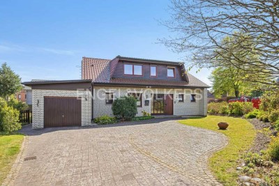 Familienfreundliches Einfamilienhaus mit modernem Komfort und idyllischem Grundstück