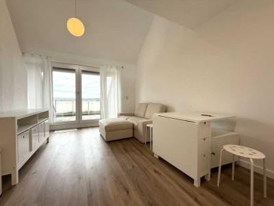 HEGERICH: Einziehen & wohlfühlen – Teilmöblierte Maisonette mit Charme in Top-Lage