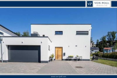 Exklusives, voll unterkellertes Architektenhaus mit ca. 376 m² Wohn-/ Nutzfläche in begehrter Lage