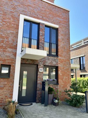 Familienidyll: neuwertiges Reihenhaus in bester Lage