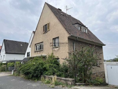 Stark sanierungsbedürftiges Doppelhaus mit 2 Wohneinheiten!