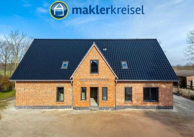 Kurz vor Fertigstellung! Ebenerdige Neubauwohnung mit Sonnenterrasse und Carport